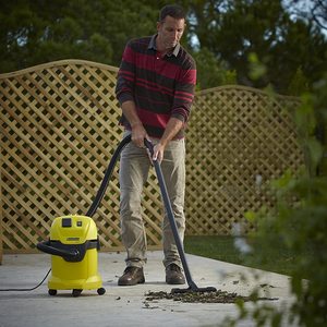 Karcher WD3P Wet and Dry Vacuum vacuuming up leaves.